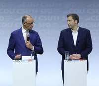 Chancellor Friedrich Merz and Vice Chancellor Lars Klingbeil during the signing of the coalition agreement for the 21st legislative period of the Bundestag on May 5th, 2025.