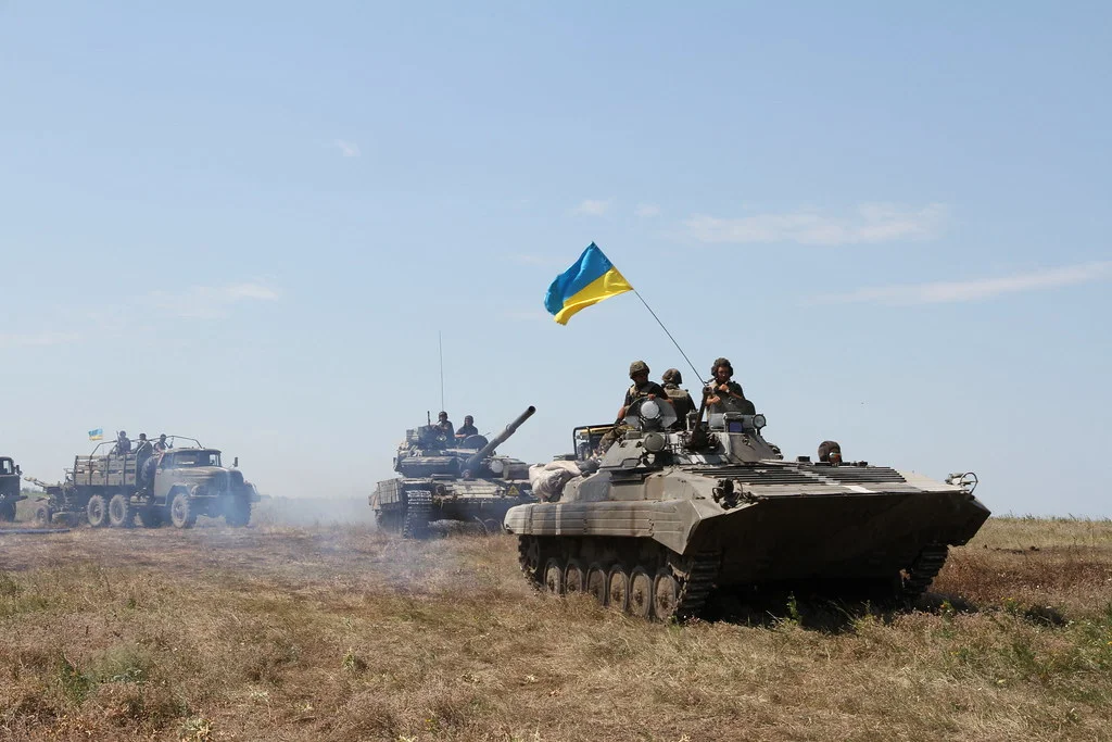 A convoy of Ukrainian military vehicles in action.