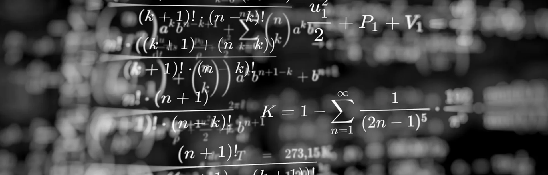 Eine Wissenschaftlerin und ein Wissenschaftler arbeiten hinter einer Glasfassade und mischen Chemikalien mit Großgeräten.